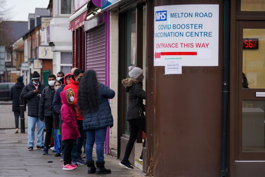 People queue at Melton Road Vaccination Centre in Leicester (PA) (PA Wire)