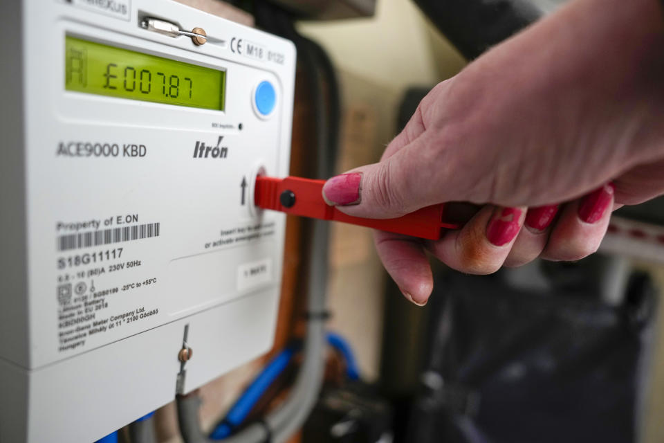 BIRMINGHAM, ENGLAND - FEBRUARY 07: In this photo illustration a prepay electricity key sits in a prepayment electricity meter in a rented home on February 07, 2023 in Birmingham, England. Ofgem has ordered all UK energy companies to suspend the practice of forcibly installing prepayment meters and will report back to the Business Secretary today. (Photo illusttration by Christopher Furlong/Getty Images)