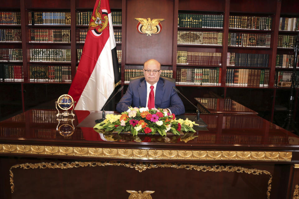 FILE - In this photo provided by Yemen's Presidency Office on Sept. 25, 2014, Yemeni President Abed Rabbo Mansour Hadi delivers a speech in his office at Presidential Palace on the occasion of the 52nd anniversary of North Yemen's the September 26, 1962 revolution in Sanaa, Yemen. (AP Photo/Yemen's Presidency Office)