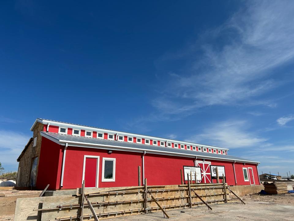 The old stucco barn that once housed the lumber from the Taylor Lumber Yard has been renovated into an event venue, available for rental by the public.