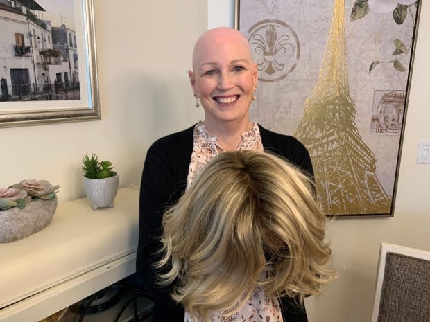 Shannon Cutler, who has had alopecia since she was a young girl recently went public about her autoimmune disorder.  (Min Dhariwal/CBC - image credit)