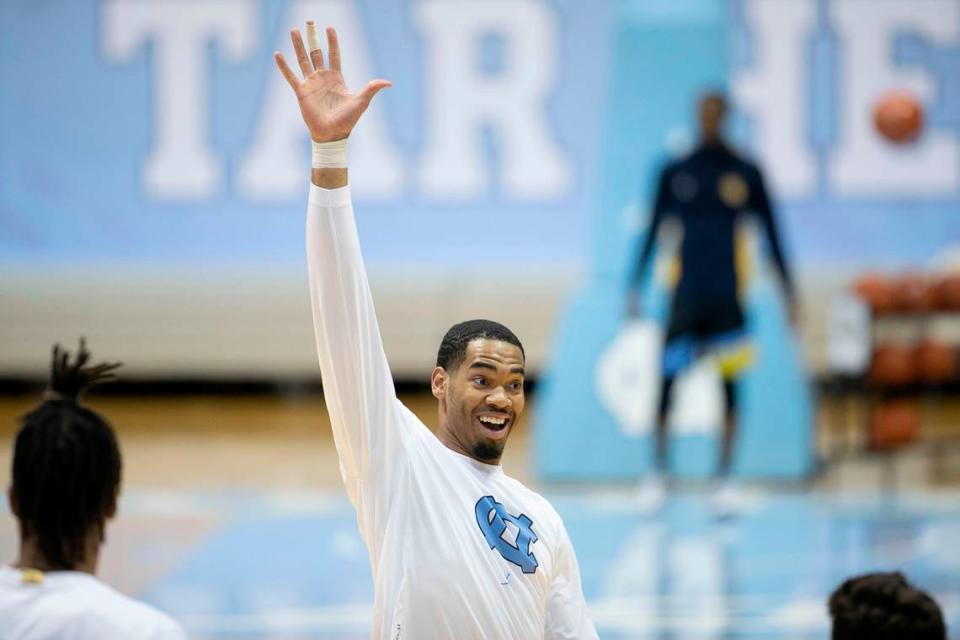 North Carolina’s Garrison Brooks (15) reacts after sinking a three-point basket prior to the Tar Heels’ game against Marquette on Wednesday, February 24, 2021 at the Smith Center in Chapel Hill, N.C.