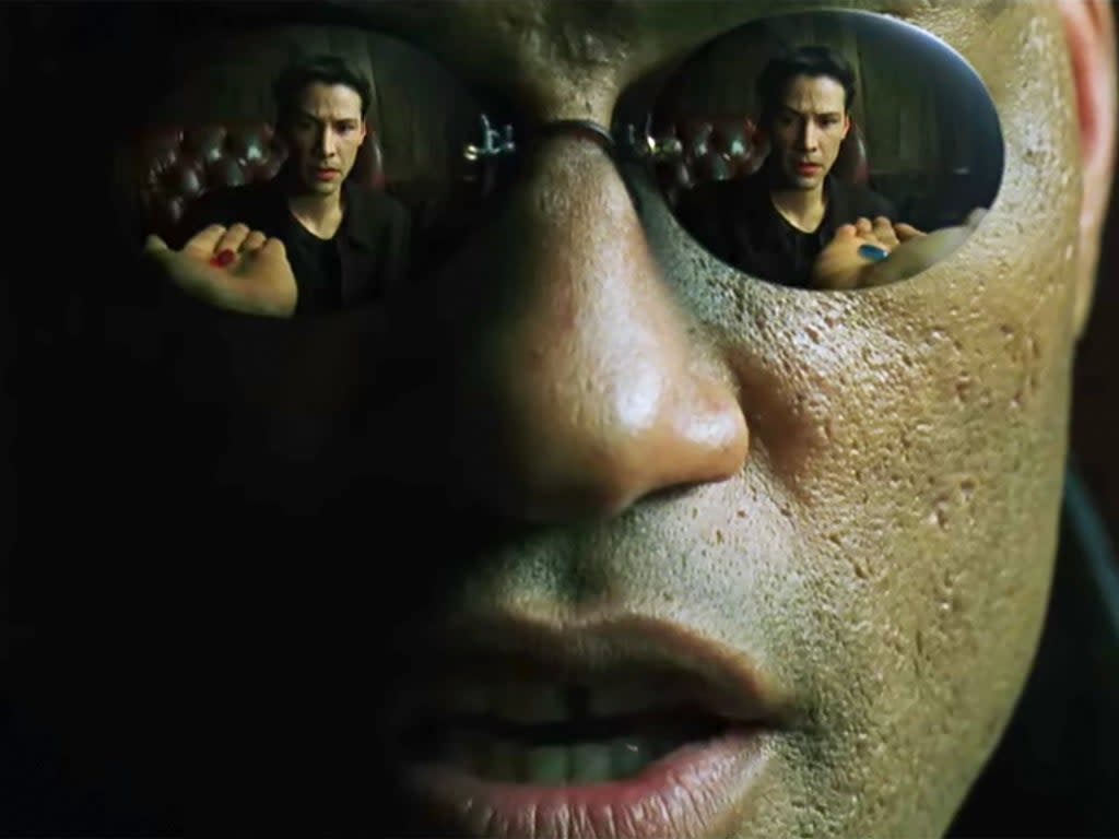 Neo (Keanu Reeves) is offered a red pill or a blue pill by Morpheus (Laurence Fishburne) in ‘The Matrix’ (Warner Bros)