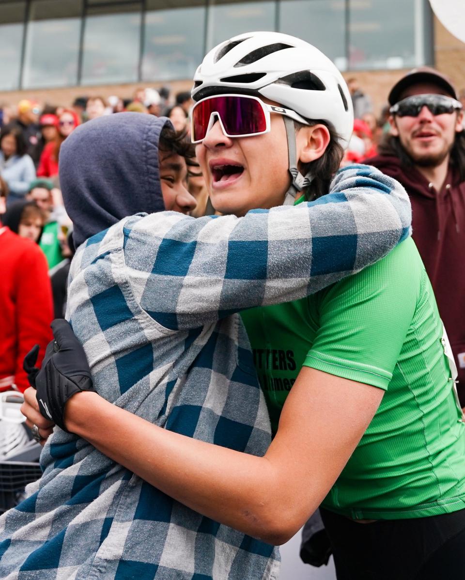 Cutters’ Judah Thompson celebrates with his younger brother Jackson after winning the 72nd running of the Men’s Little 500 at Bill Armstrong Stadium on Saturday, April 22, 2023.