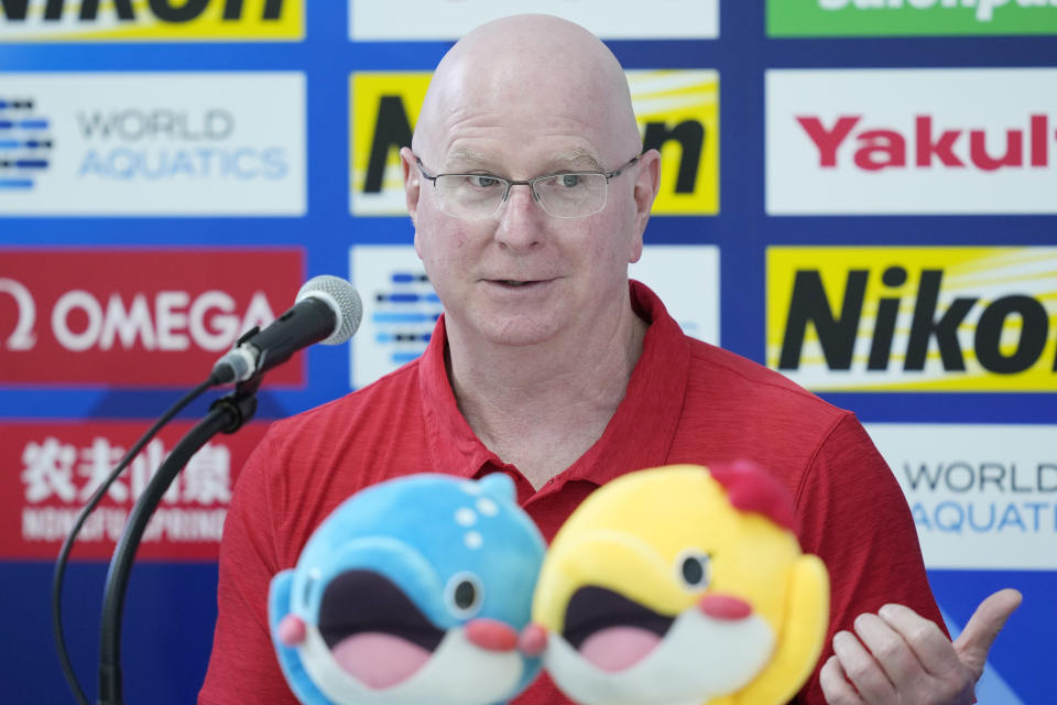 U.S. head coach Bob Bowman speaks during a news conference at the World Swimming Championships in Fukuoka, Japan, Friday, July 21, 2023. (AP Photo/Eugene Hoshiko)