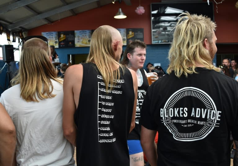 More than 150 people showcasing the hairstyle popular in the 1970s and 1980s flocked to the small town