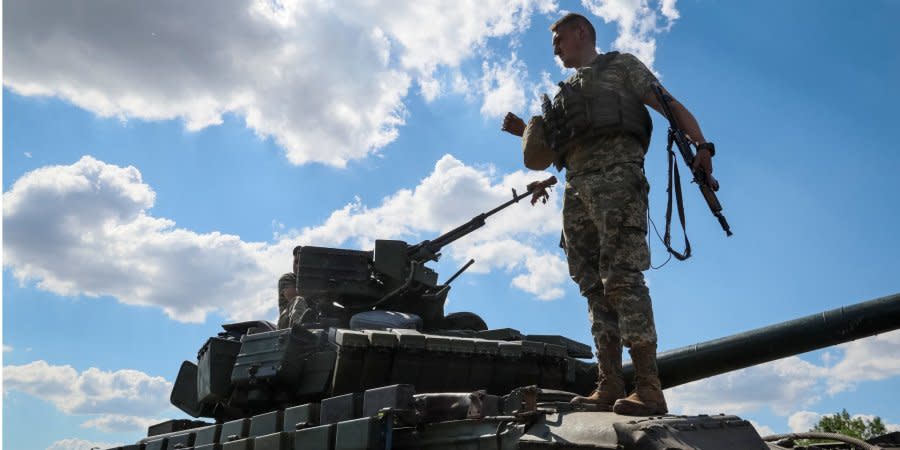 A Ukrainian soldier on a tank