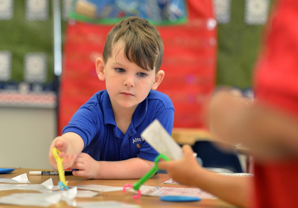 Sylas Cox, 5, concentrates during a project in class on July 20 at Alta Vista Elementary School’s summer Eagle Academy.