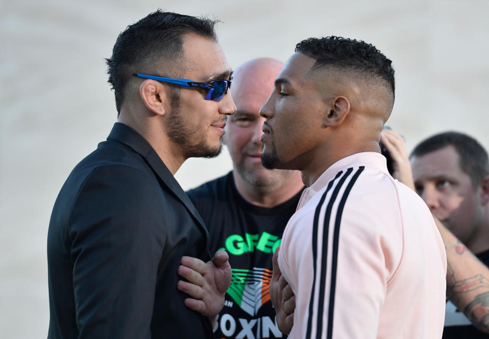 Tony Ferguson (L) and Kevin Lee face off during a media event at the UFC’s headquarters in Las Vegas. (Getty)