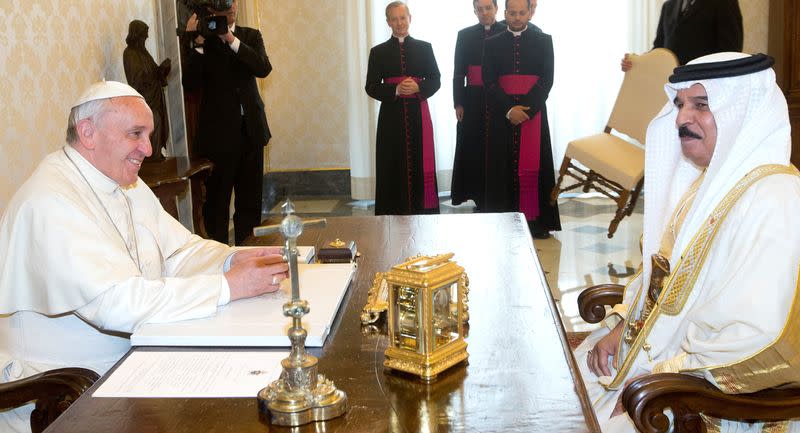 FILE PHOTO: Pope Francis speaks with King of Bahrain Hamad bin Isa Al Khalifa during a meeting at the Vatican