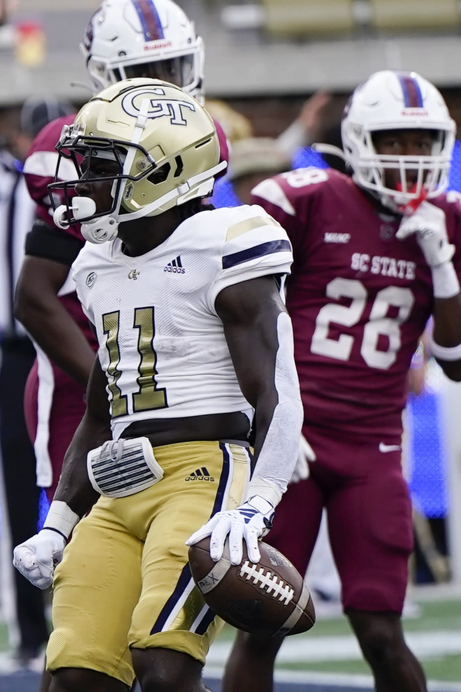 Georgia Tech running back Jamal Haynes (11) runs into the end zone for a touchdown against South Carolina State during the first half of an NCAA college football game, Saturday, Sept. 9, 2023, in Atlanta. (AP Photo/Mike Stewart)