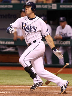 Evan Longoria watches as his 12th-inning homer sails toward the left-field wall at Tropicana Field