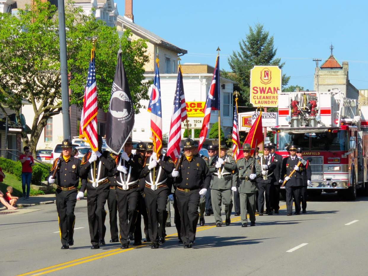 A joint color guard representing the Richland County Sheriff's Office, Mansfield Correctional Institution and the IAFF Local 266 lead the 2018 Labor Day Parade.