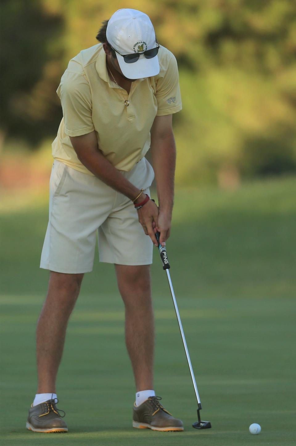 Flynn McNabb tries to drain a putt on the 16th hole during the final round of the San Angelo Country Club Men's Partnership on Sunday, June 26, 2022.