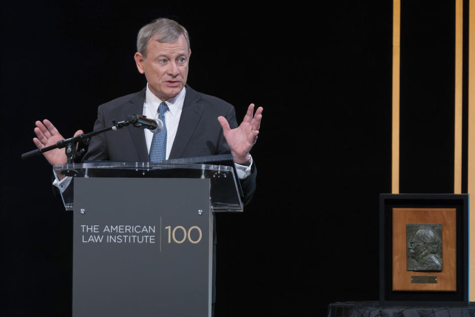 Supreme Court Chief Justice John Roberts speaks as her receives the Henry J. Friendly Medal during the American Law Institute's annual dinner in Washington, Tuesday, May 23, 2023. (AP Photo/Jose Luis Magana)