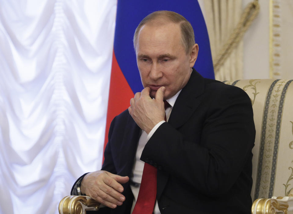 Russian President Vladimir Putin gestures during his meeting with Belarus' President Alexander Lukashenko at Konstantin palace in St.Petersburg, Russia, Monday, April 3, 2017. Following an explosion on the subway in St. Petersburg, Putin, who was visiting the city on an unrelated trip Monday, said investigators are looking into whether the explosion was a terror attack. (AP Photo/Dmitri Lovetsky, pool)