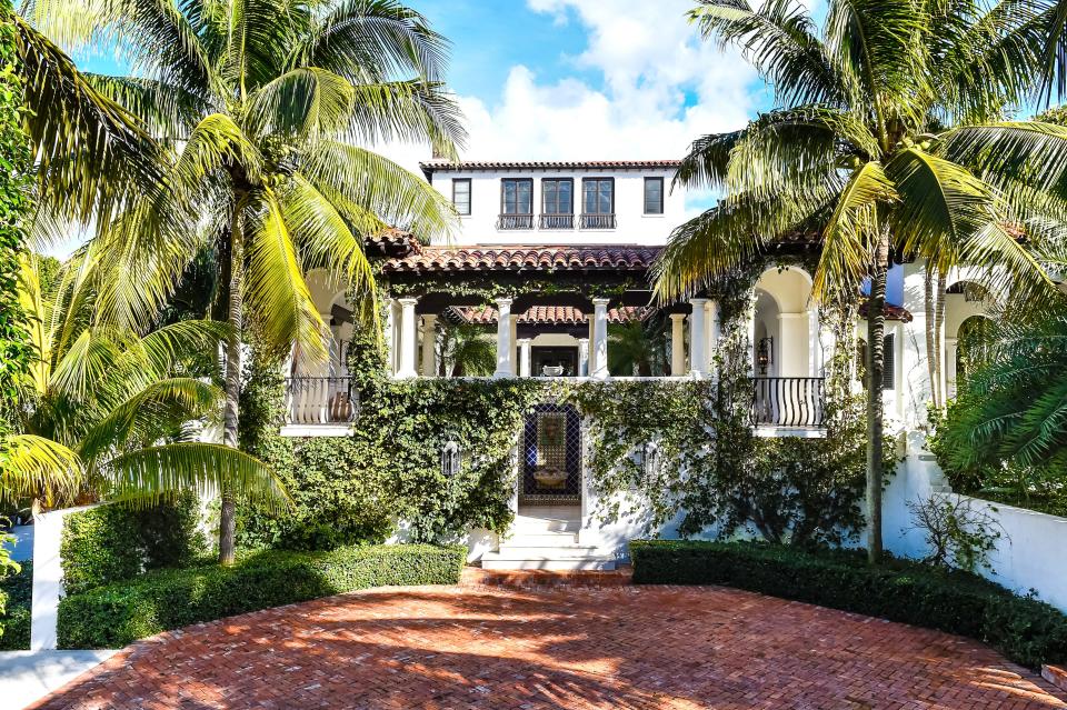 A restored landmarked house near the Intracoastal Waterway at 12 Lagomar Road in Palm Beach is offered for a seasonal rental with a six-month minimum at $125,000 a month; or annually at $100,000 a month.