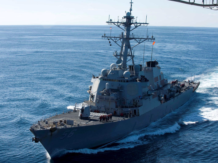 FILE PHOTO: The guided-missile destroyer USS John S. McCain approaches the aircraft carrier USS George Washington for a fueling at sea in this December 5, 2010 handout photo courtesy of the U.S. Navy. U.S. Navy/Mass Communication Specialist Seaman Cheng S. Yang/Handout via REUTERS/File Photo