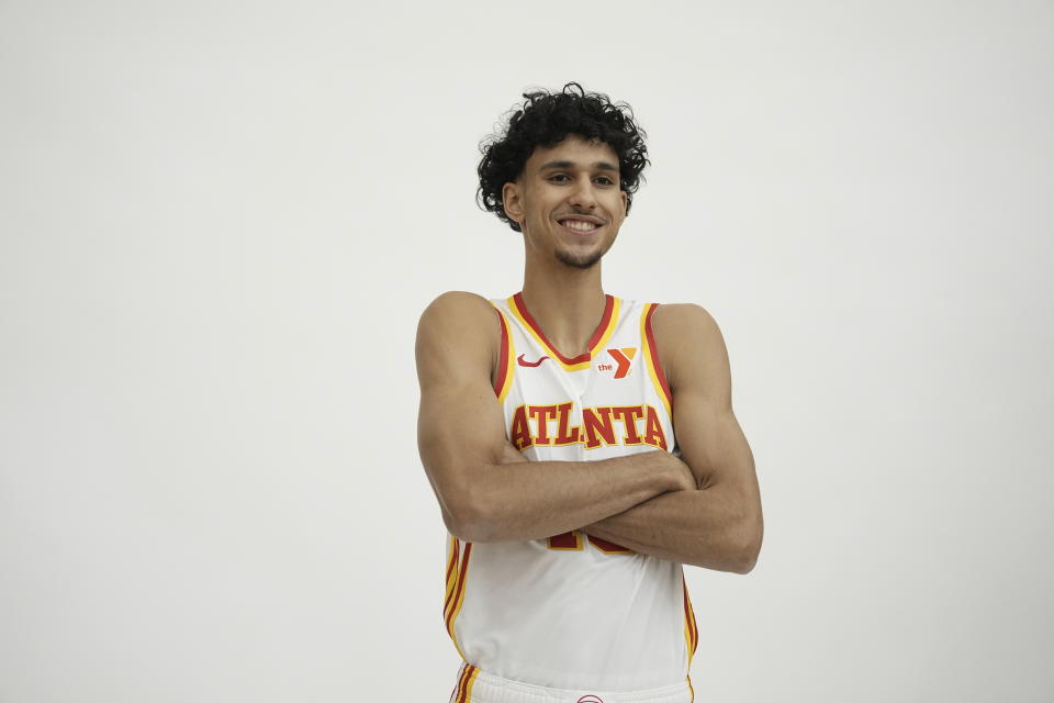 Atlanta Hawks' Zaccharie Risacher poses for a photograph after a news conference, Friday, June 28, 2024, in Atlanta. Risacher was selected as the first overall pick by the Atlanta Hawks in the first round of the NBA basketball draft. AP Photo/Brynn Anderson)