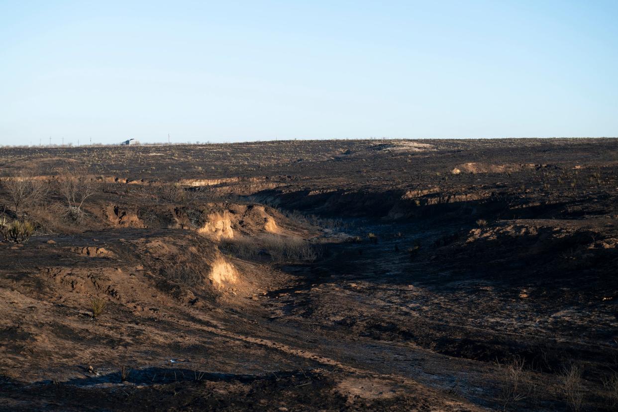 Remnants of the Windy Deuce Fire are seen between Fritch and Amarillo on Friday, March. 1.