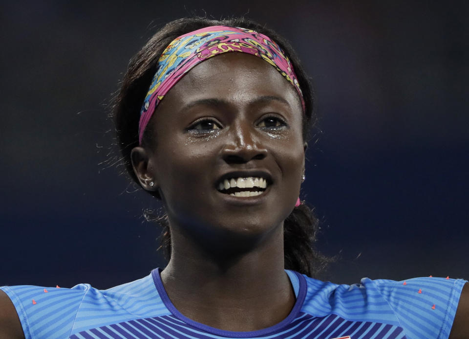 FILE - United States' Tori Bowie wins a women's 200-meter semifinal during the athletics competitions of the 2016 Summer Olympics at the Olympic stadium in Rio de Janeiro, Brazil, Tuesday, Aug. 16, 2016. In and around track circles, where Bowie's absence is hitting particularly hard as the sport readies for its first world championships since her death, the Olympic gold medalist's struggles with mental health were more than an afterthought. (AP Photo/David J. Phillip, File)