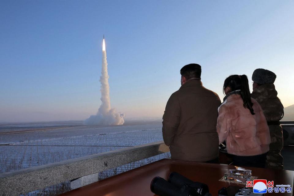 PHOTO: This undated picture released by North Korea's official Korean Central News Agency on Dec.19, 2023, shows Kim Jong Un and his daughter watching the test launch of an intercontinental ballistic missile ICBM at an undisclosed location.  (Korean Central News Agency via KNS/AFP via Getty Image)