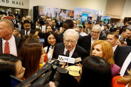 Warren Buffett tours the exhibit hall during the Berkshire Hathaway Annual Shareholders Meeting at the CenturyLink Center in Omaha, Nebraska, U.S. April 30, 2016. REUTERS/Ryan Henriksen