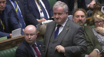 Scottish Nationalist Party Westminster leader Ian Blackford speaking in the House of Commons, London during the debate for the European Union (Withdrawal Agreement) Bill: Second Reading. Tuesday Oct. 22, 2019. British Prime Minister Boris Johnson's European Union divorce bill faces two votes Tuesday, with lawmakers first being asked to approve it in principle, followed by a vote on the government's schedule for debate and possible amendments. (House of Commons/via AP)