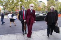 E. Jean Carroll arrives at the Daniel Patrick Moynihan United States Courthouse, Wednesday, Oct. 21, 2020, in New York. Carroll, who says President Donald Trump raped her in the 1990s, was expected to be in court Wednesday to hear lawyers argue whether Trump can substitute the United States for himself as the defendant in her defamation lawsuit. (AP Photo/John Minchillo)