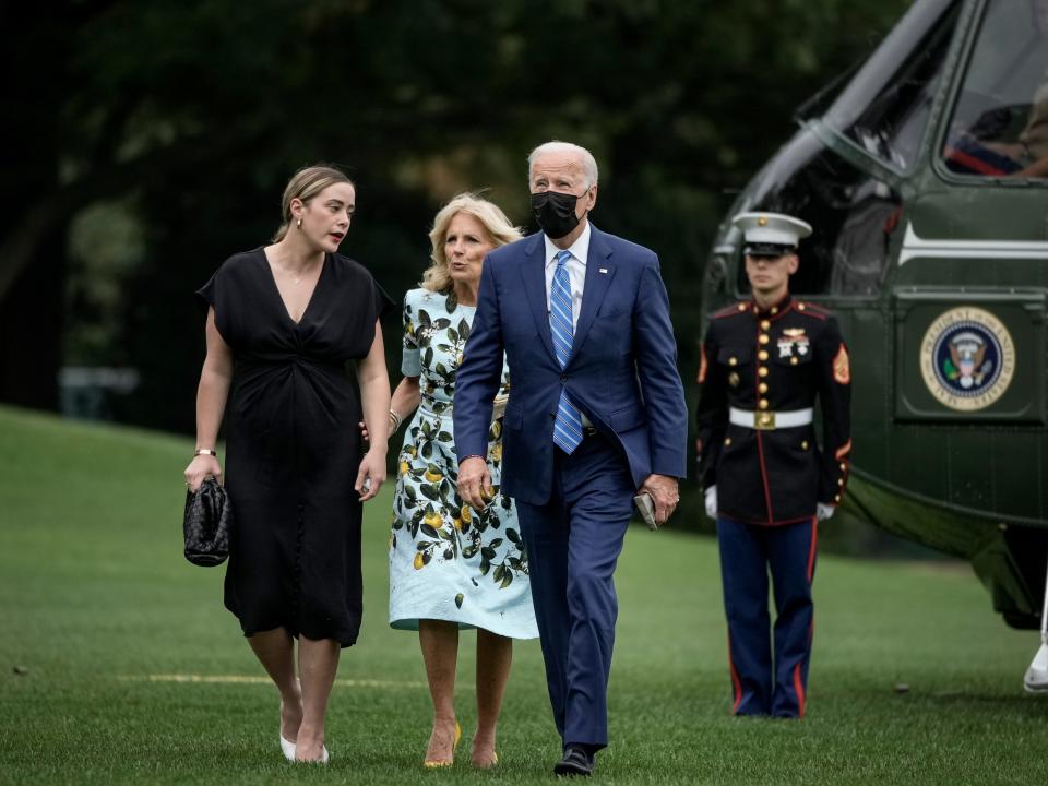 Granddaughter Naomi Biden, U.S. President Joe Biden and first lady Jill Biden exit Marine One on the South Lawn of the White House October 11, 2021 in Washington, DC. Biden and family spent the long weekend in Delaware.