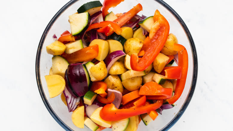 Vegetables and marinade in bowl