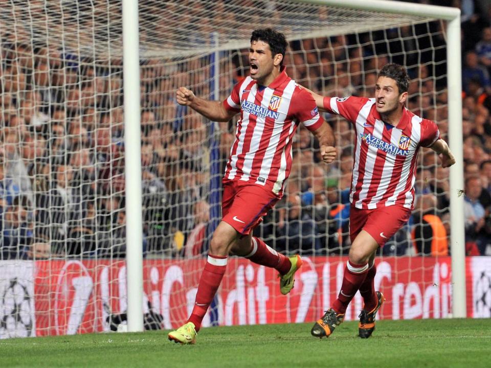 Diego Costa celebrates scoring for Atletico Madrid against Chelsea in 2014, with former teammate Koke (AFP/Getty Images)