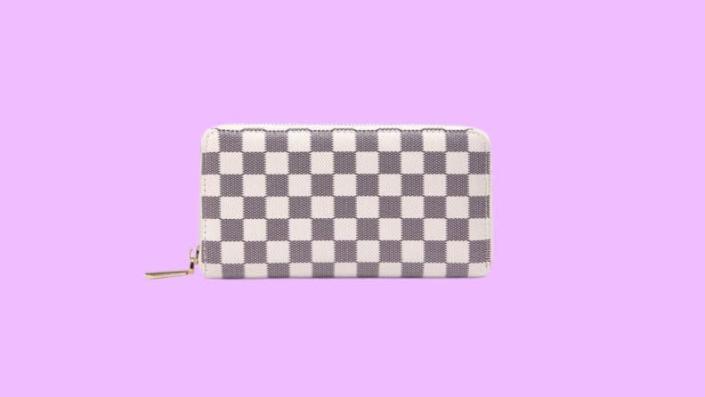 Hide your small makeup essentials in this Daisy Rose clutch.