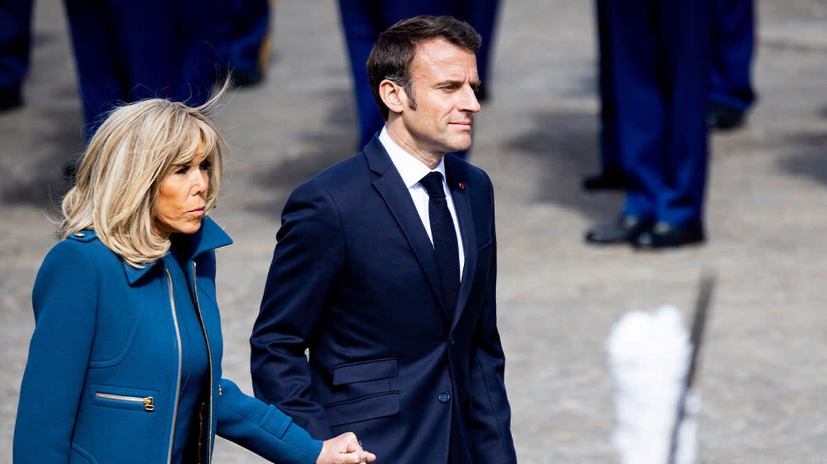 Emmanuel Macron pushed through the plans without a vote (Reuters)