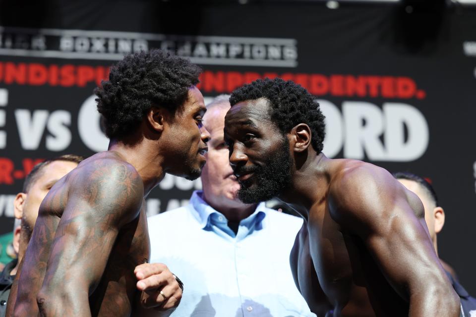 Errol Spence Jr. and Terrence Crawford face off during weigh-ins at T-Mobile Arena.