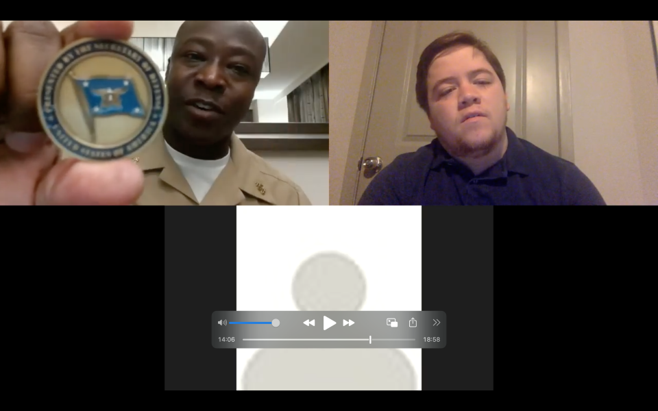 During a ZOOM interview, Chief Electrician’s Mate Recardo Wright, from Sylvania, Georgia, shows off the challenger coin he received from U.S. Secretary of Defense Lloyd Austin on June 12, 2022. The coin's side he is showing illustrates Austin's four-star general status. The other side bears the seal of the Secretary of Defense.