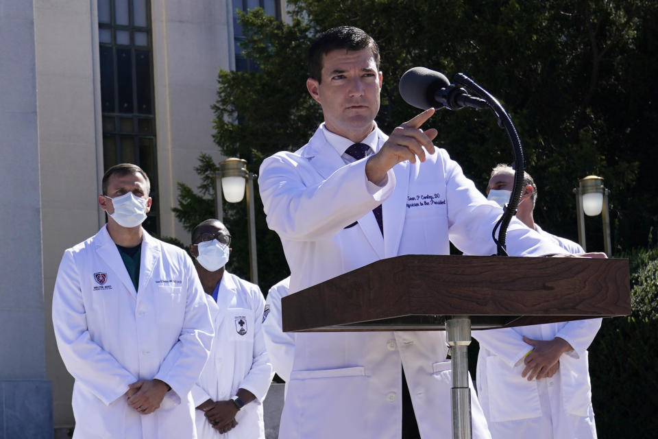 Dr. Sean Conley, physician to President Donald Trump, briefs reporters at Walter Reed National Military Medical Center in Bethesda, Md., Saturday, Oct. 3, 2020. Trump was admitted to the hospital after contracting the coronavirus. (AP Photo/Susan Walsh)