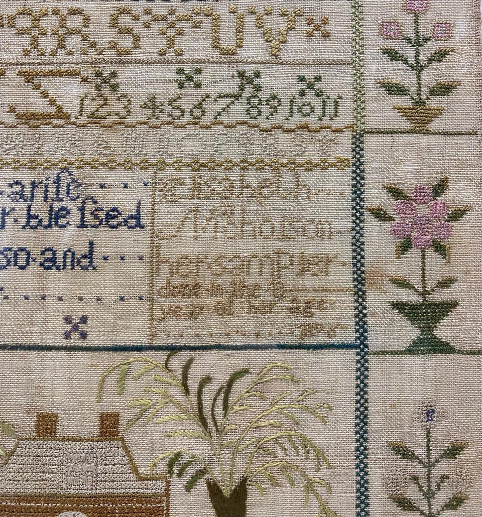 Close-up of a sampler by "Elisabeth Nicholson" in the Washington County Historical Society's collection.