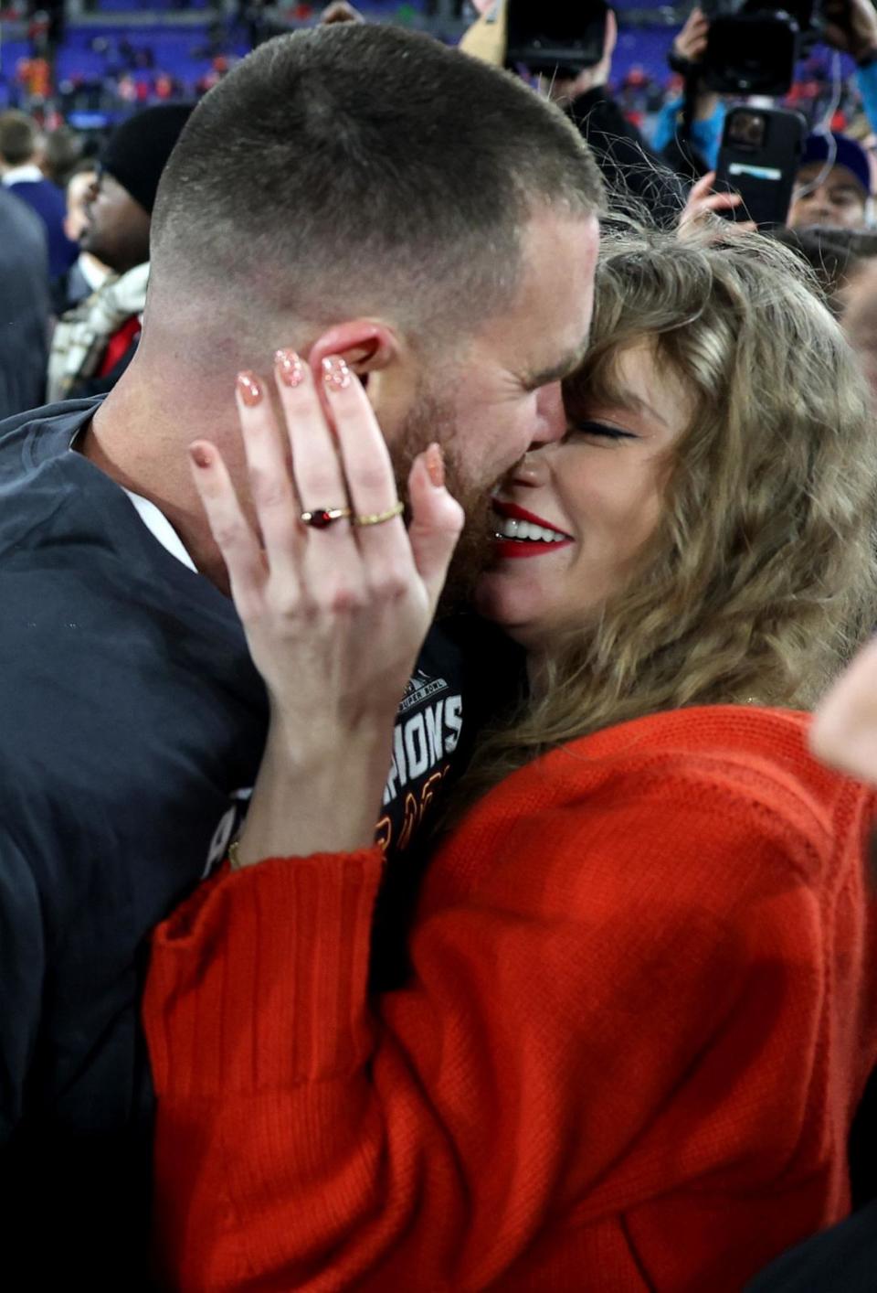 PHOTO: Travis Kelce of the Kansas City Chiefs celebrates with Taylor Swift after a 17-10 victory against the Baltimore Ravens in the AFC Championship Game in Baltimore, MD, Jan. 28, 2024 .  (Patrick Smith/Getty Images)