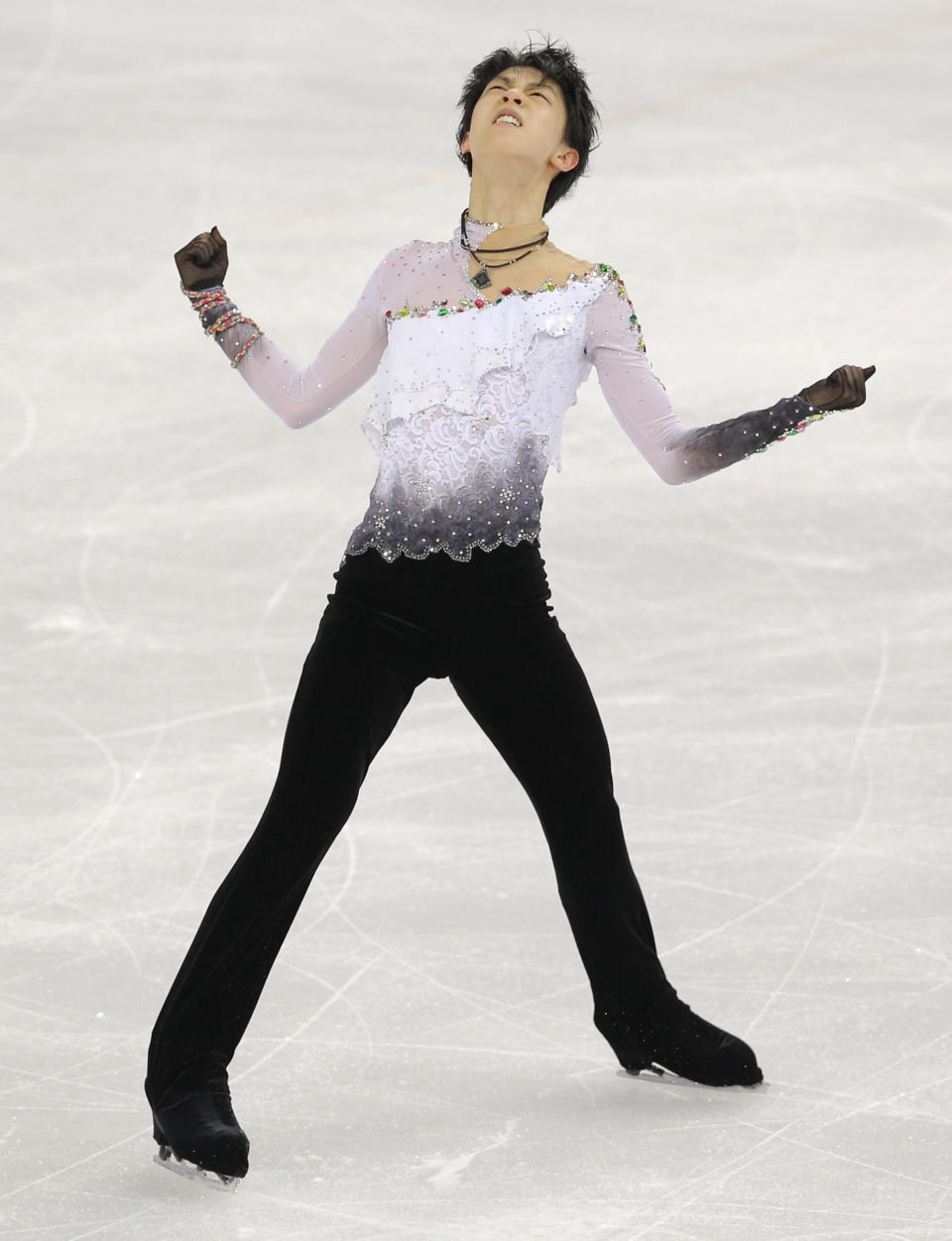 Yuzuru Hanyu of Japan competes in the men's free skate figure skating final at the Iceberg Skating Palace during the 2014 Winter Olympics, Friday, Feb. 14, 2014, in Sochi, Russia. (AP Photo/Vadim Ghirda)