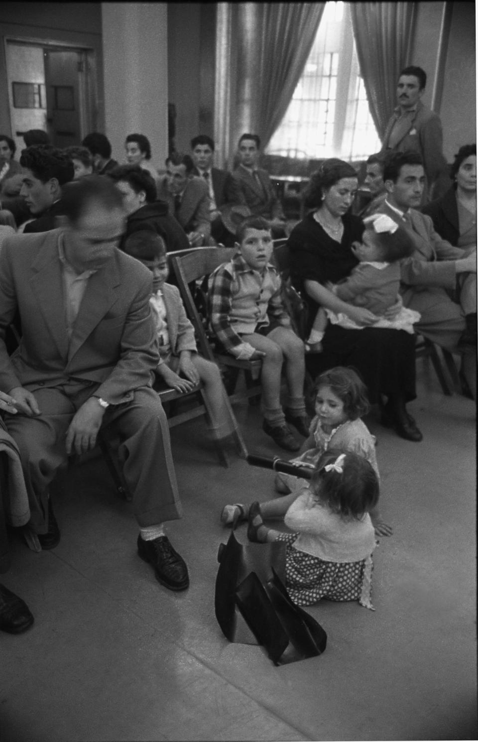 Raffaele Greco and his children on the Saturnia, waiting to go to the Ellis Island Immigration Station in New York, N.Y., in October of 1950.