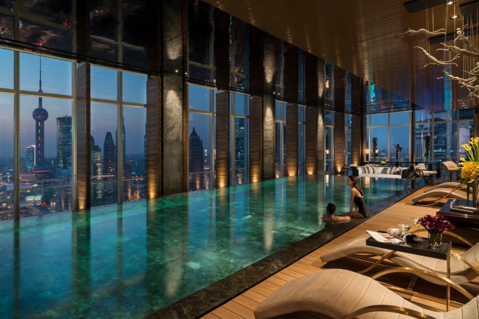 If you're visiting Shanghai, a trip to the <strong>Four Seasons Hotel Pudong</strong> hotel is a must. Perched high in the sky, guests will enjoy jaw-dropping views of the city's downtown, while relaxing in the hotel's infinity pool.