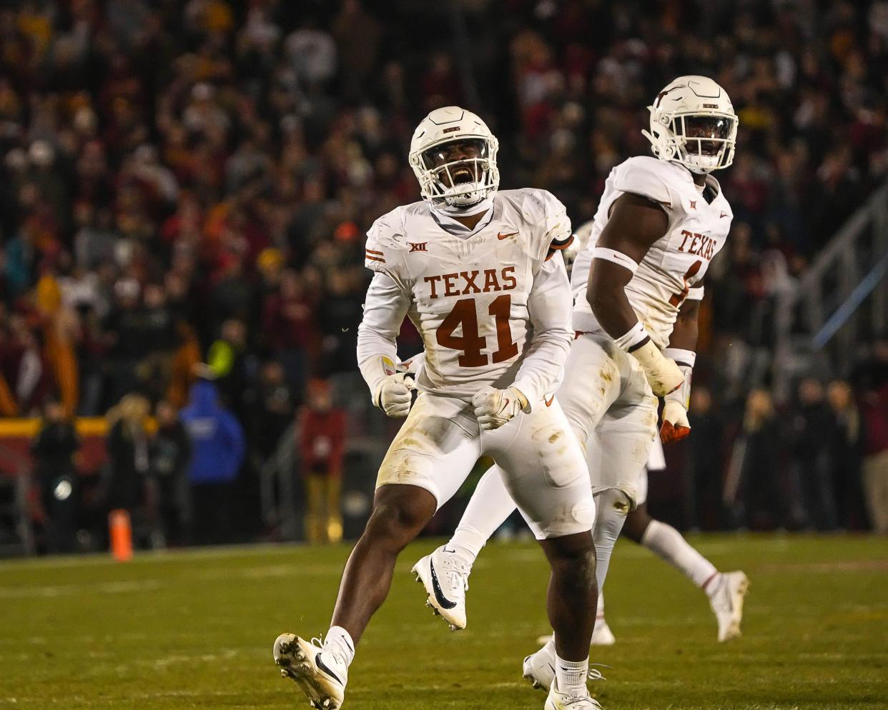 Texas linebacker Jaylan Ford celebrates a defensive stop during the Longhorns' win at Iowa State last season. Ford turned in a solid performance at the Texas pro day in front of 100 NFL personnel, including three head coaches. He's been talking to the Saints, Jets, Giants, Dolphins and Patriots.