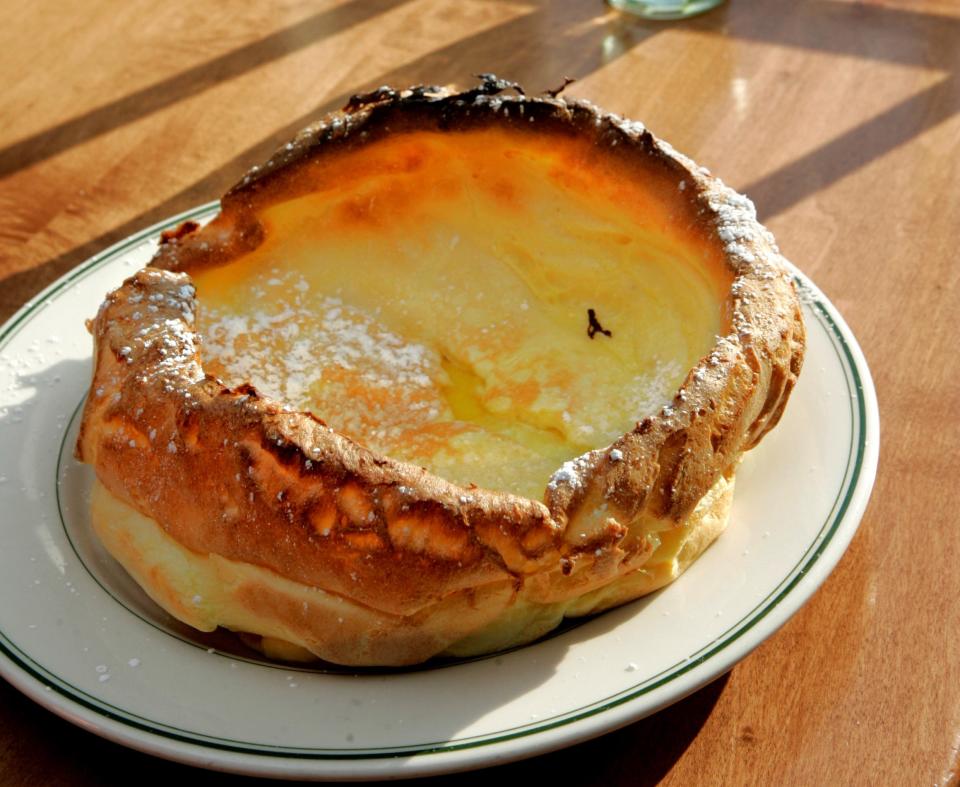 A Dutch Baby oven-baked pancake was among the big breakfasts served at the east side location of the Original Pancake House.