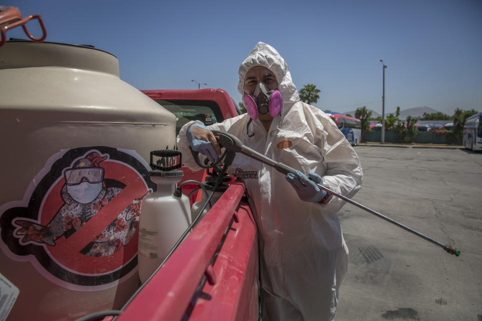 "Ghost Busters" als Vorbild: "Covid-Jäger" in Tijuana (Bild: Omar Martínez/dpa)