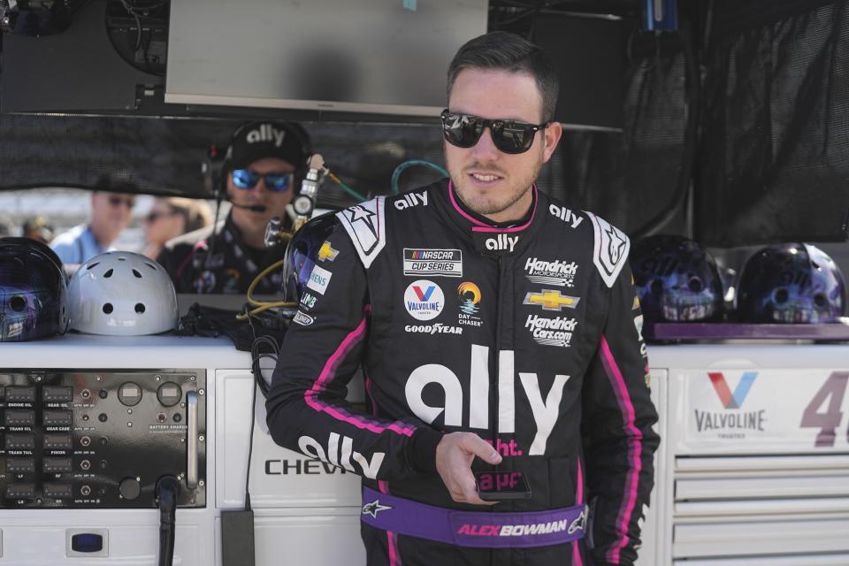 Alex Bowman waits to drive during a practice session for the NASCAR Cup Series auto race at Indianapolis Motor Speedway, Saturday, Aug. 12, 2023, in Indianapolis. (AP Photo/Darron Cummings)