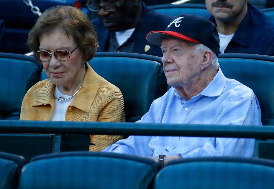 PHOTO: Former President Jimmy Carter and his wife Rosalynn look on prior to the game between the Atlanta Braves and the Toronto Blue Jays, Sept. 17, 2015 in Atlanta. (Kevin C. Cox/Getty Images)