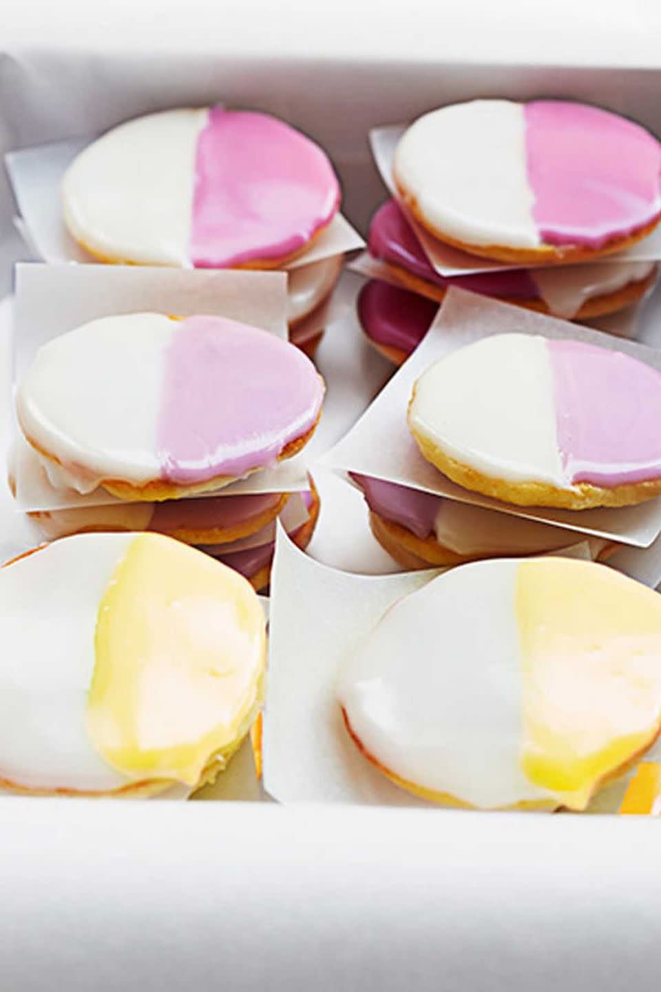 <p>Use pastel colors to transform classic black-and-white cookies into these wonderful spring treats.</p><p>Get the <a href="https://www.womansday.com/food-recipes/food-drinks/recipes/a39599/mini-black-white-cookies-recipe-ghk0514/" rel="nofollow noopener" target="_blank" data-ylk="slk:Mini "Black and White" Cookies recipe.;elm:context_link;itc:0;sec:content-canvas" class="link "><strong>Mini "Black and White" Cookies recipe.</strong></a></p>