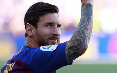 Lionel Messi salutes the fans - Credit: getty images