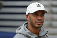 St. Peter's University basketball coach Shaheen Holloway speaks to reporters before NCAA college basketball practice, Tuesday, March 22, 2022, in Jersey City, N.J. (AP Photo/Seth Wenig)